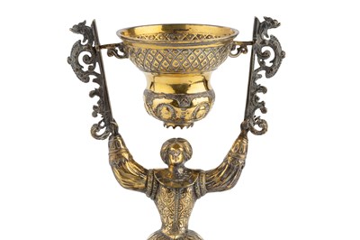 Lot 606 - A Continental silver-gilt wager cup, modelled...