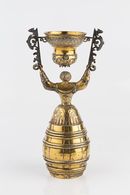 Lot 606 - A Continental silver-gilt wager cup, modelled...
