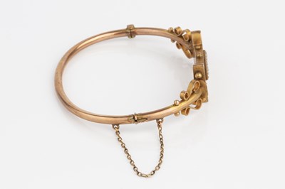 Lot 18 - A Victorian half pearl bangle, of hollow...