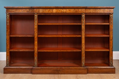 Lot 11 - A Victorian walnut low breakfront bookcase