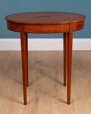 Lot 487 - An antique satinwood oval lamp table