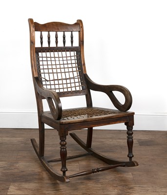 Lot 82 - Rocking chair Dutch Colonial, possibly teak,...
