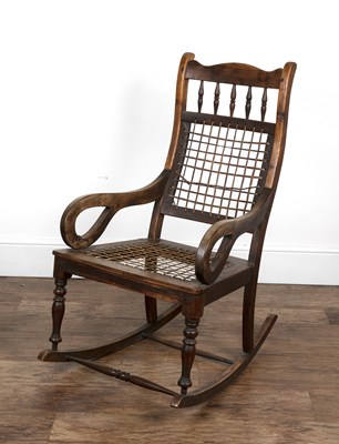 Lot 82 - Rocking chair Dutch Colonial, possibly teak,...