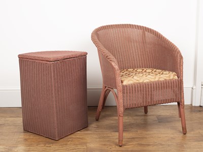 Lot 67 - Lloyd Loom pink wicker armchair, with drop in...