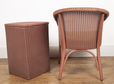 Lot 67 - Lloyd Loom pink wicker armchair, with drop in...