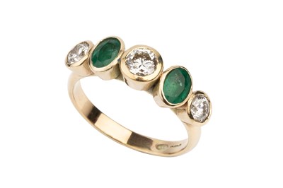Lot 123 - An emerald and diamond five stone ring,...