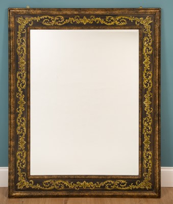 Lot 576 - A large wall mirror