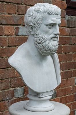 Lot 1343 - A cast reconstituted bust of Aristotle on a matching fluted plinth