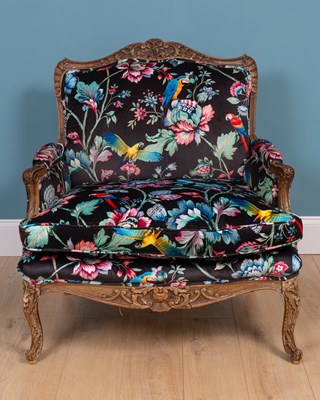 Lot 276 - A 18th century French style broad armchair