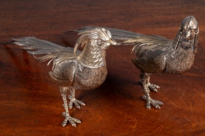 Lot 224 - A pair of white metal sculptures depicting golden pheasants