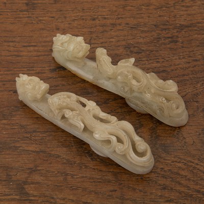 Lot 282 - Pair of mutton fat jade buckles Chinese, 19th...