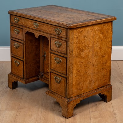 Lot 470 - A George I burr elm knee hole desk