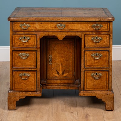 Lot 470 - A George I burr elm knee hole desk