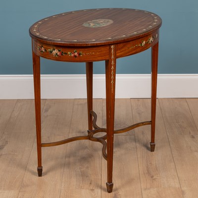 Lot 221 - An Edwardian satinwood oval occasional table