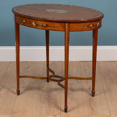 Lot 221 - An Edwardian satinwood oval occasional table