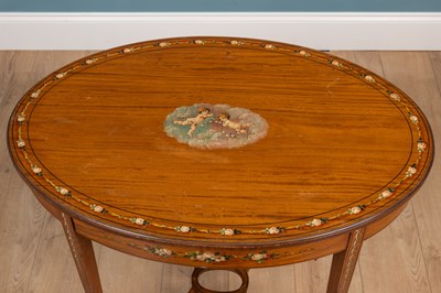 Lot 221 - An Edwardian satinwood oval occasional table