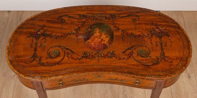 Lot 143 - An Edwardian satinwood kidney shaped occasional table