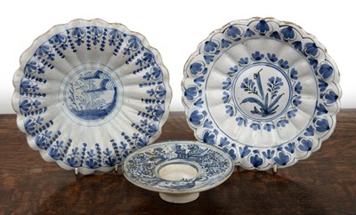 Lot 399 - Two blue and white tin-glazed dishes...