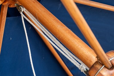 Lot 1274 - A large blue parasol by the Colonial Company