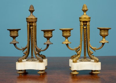 Lot 35 - A pair of antique French gilt metal two-branch candelabra