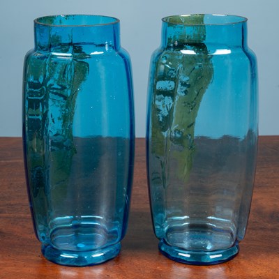 Lot 132 - A pair of Continental painted blue glass vases