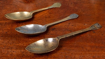 Lot 362 - A group of three antique brass or latten spoons