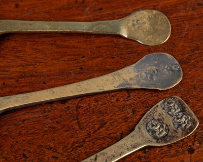 Lot 362 - A group of three antique brass or latten spoons