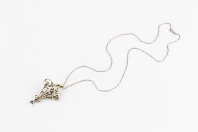 Lot 59 - An Art Nouveau style diamond pendant, designed...