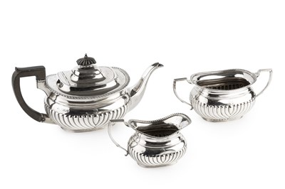 Lot 612 - An Edwardian silver three piece tea service,...