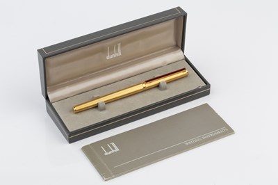 Lot 519 - A Dunhill gold plated fountain pen, with...