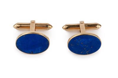 Lot 113 - A pair of hardstone cufflinks, with oval lapis...