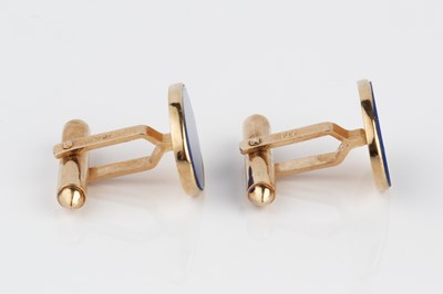 Lot 113 - A pair of hardstone cufflinks, with oval lapis...