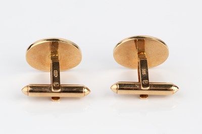 Lot 113 - A pair of hardstone cufflinks, with oval lapis...