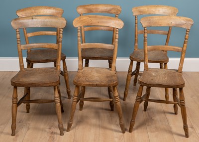 Lot 355 - A set of six ash and elm kitchen chairs