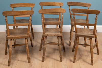 Lot 355 - A set of six ash and elm kitchen chairs