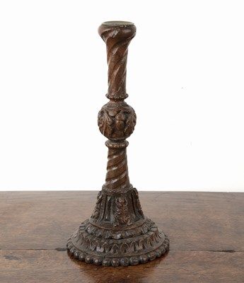 Lot 224 - Treen candlestick of trumpet form early 18th...