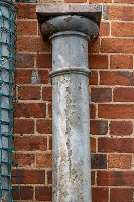 Lot 206 - A group of four heavy cast iron columns