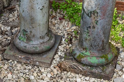 Lot 206 - A group of four heavy cast iron columns