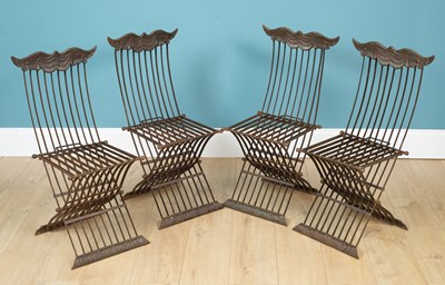 Lot 1239 - A set of four cast and wrought iron folding garden seats; together with a folding café type chair