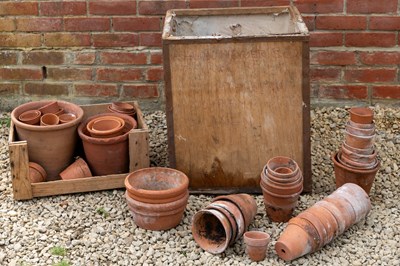 Lot 1276 - A large collection of various terracotta flowerpots