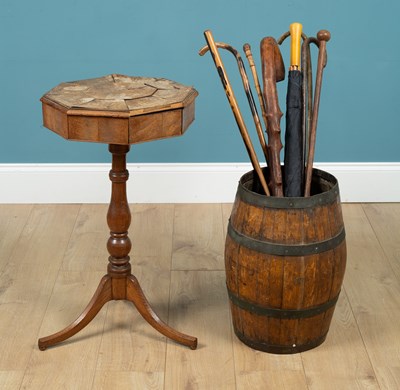 Lot 364 - A brass bound stick stand modelled as a barrel and a sewing box on stand