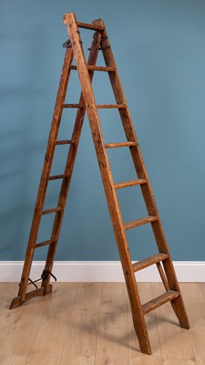 Lot 318 - An old pitch pine extending ladder