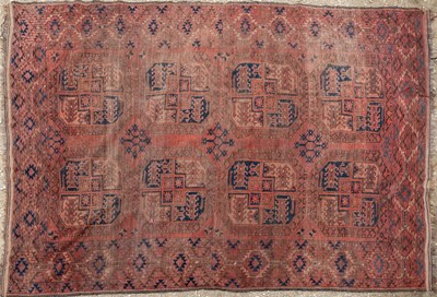 Lot 1061 - A red ground Oriental large rug