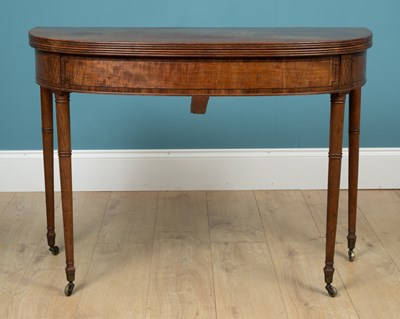 Lot 362 - A Regency mahogany D-end fold-over console...