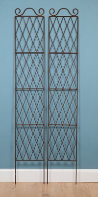 Lot 1238 - A pair of wrought iron trellis-work panels