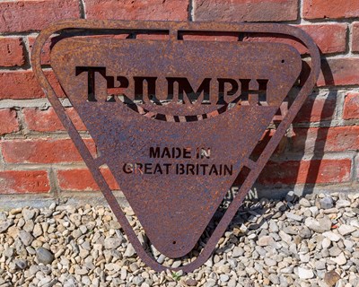 Lot 1187 - A pierced steel Triumph Motorcycles sign