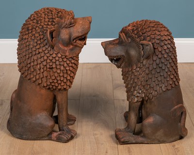 Lot 1339 - Two similar terracotta Oriental temple dogs