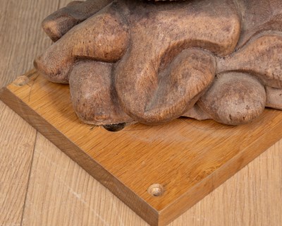 Lot 1314 - A carved Oriental hardwood sculpture of a dragon
