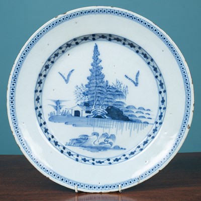 Lot 439 - An 18th century English Delftware large plate or charger, possibly Lambeth