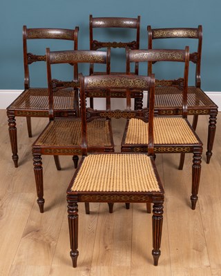 Lot 506 - A set of six Regency faux rosewood and rosewood veneered bar back dining chairs